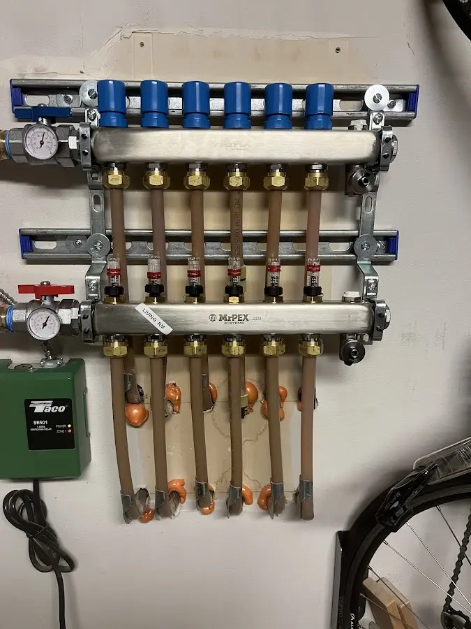 Plumber performing Leak Detection at a residential property in Akron